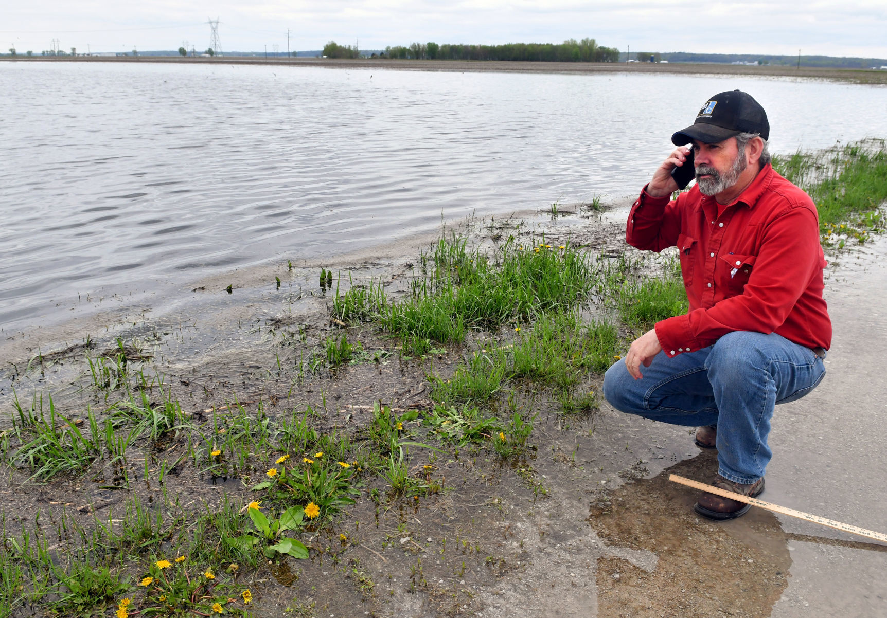 Farmers dealing with flooded fields